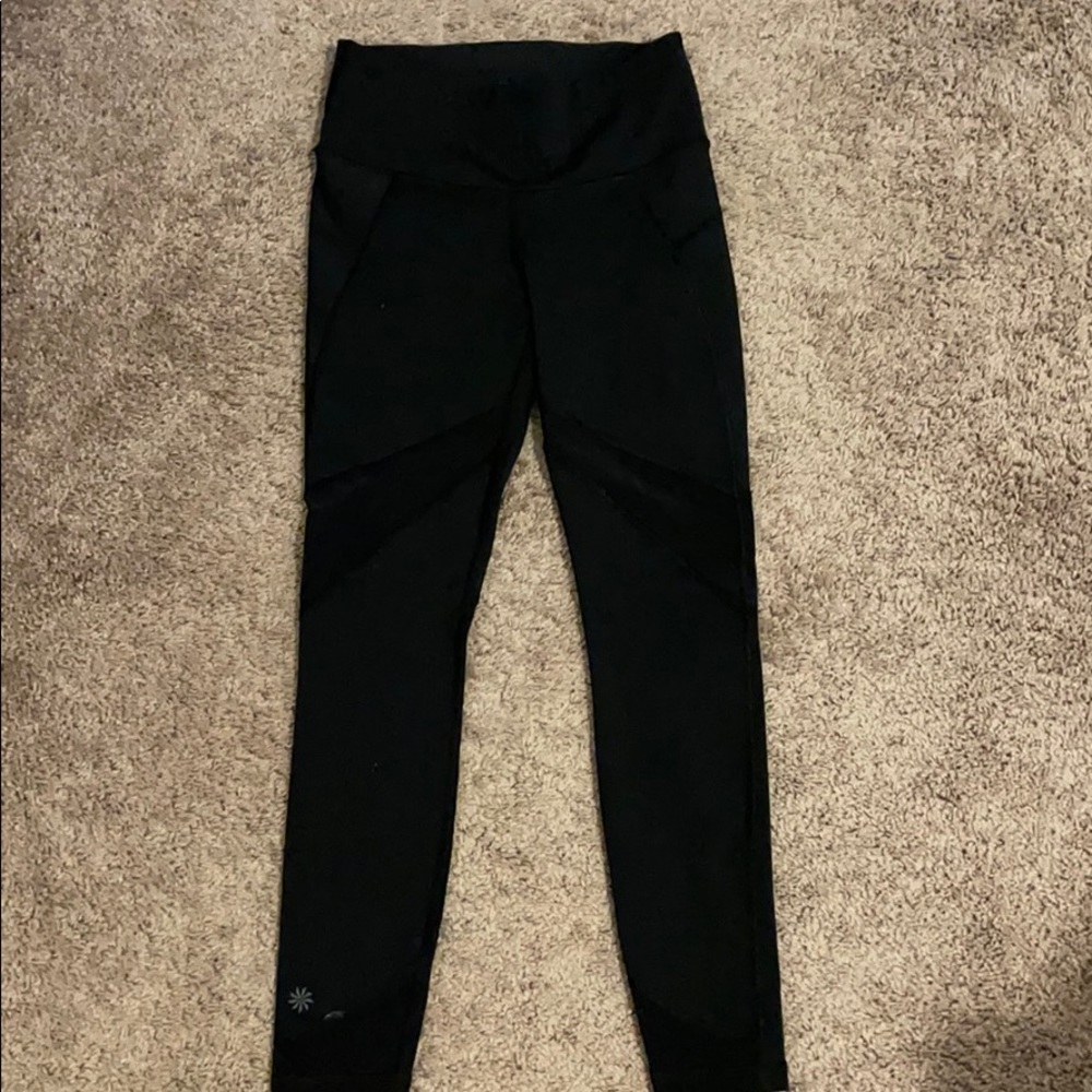 Athleta tights with shear netting on sides, ankles